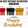 Car boot birthday decoration kit contents with 5 red, 5 black, 5 gold balloons, gold Happy Birthday banner and glue dots for boys birthday surprise decoration.