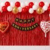 anniversary-red-white-optimized Red white anniversary decoration with foil curtain, black gold banner and Love You heart foils