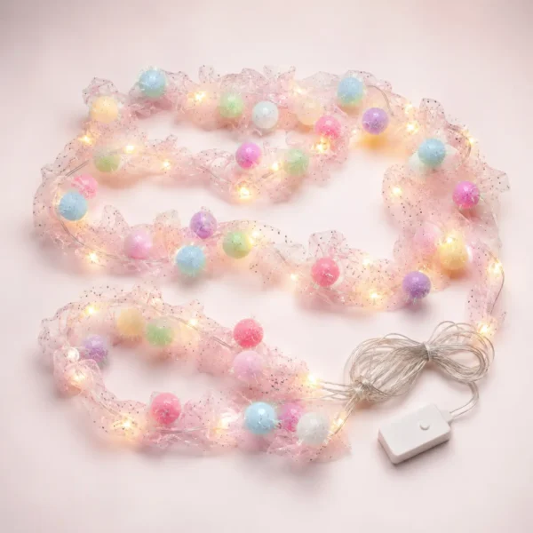 Pastel Pom Pom LED String Light Pastel pom pom LED string light with pink glitter mesh and warm white lights